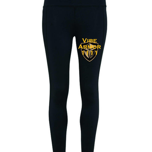 Woman wearing navy TriDri TD531 ladies' Vibe Armor performance leggings with side pockets, elastic waistband, in eco-conscious activewear pose