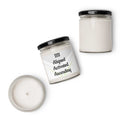 Handcrafted scented soy candle in glass jar for spiritual rituals and meditation