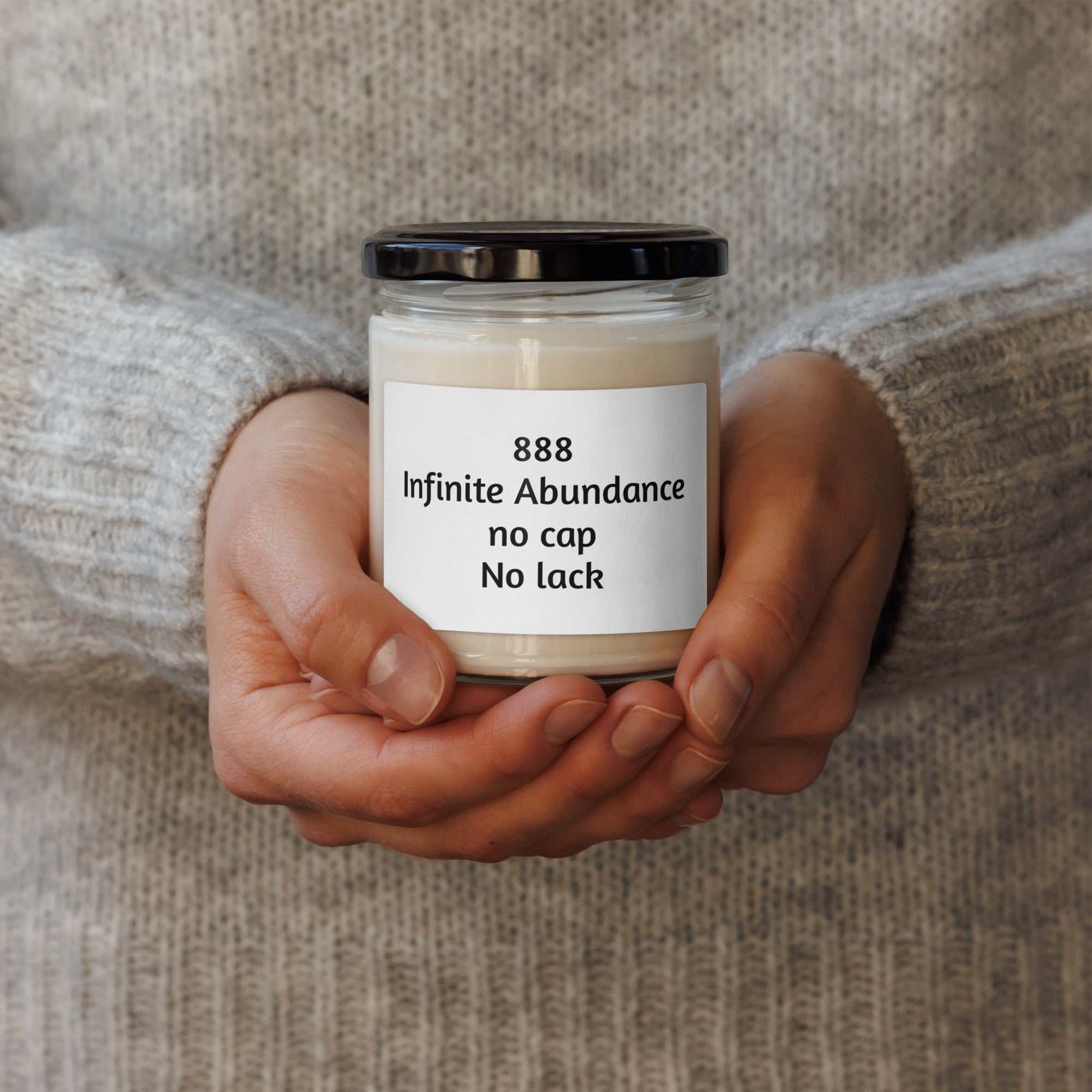 Scented soy candle in a spiritual glass jar labeled Divine Energy Candle by Vibe Armor